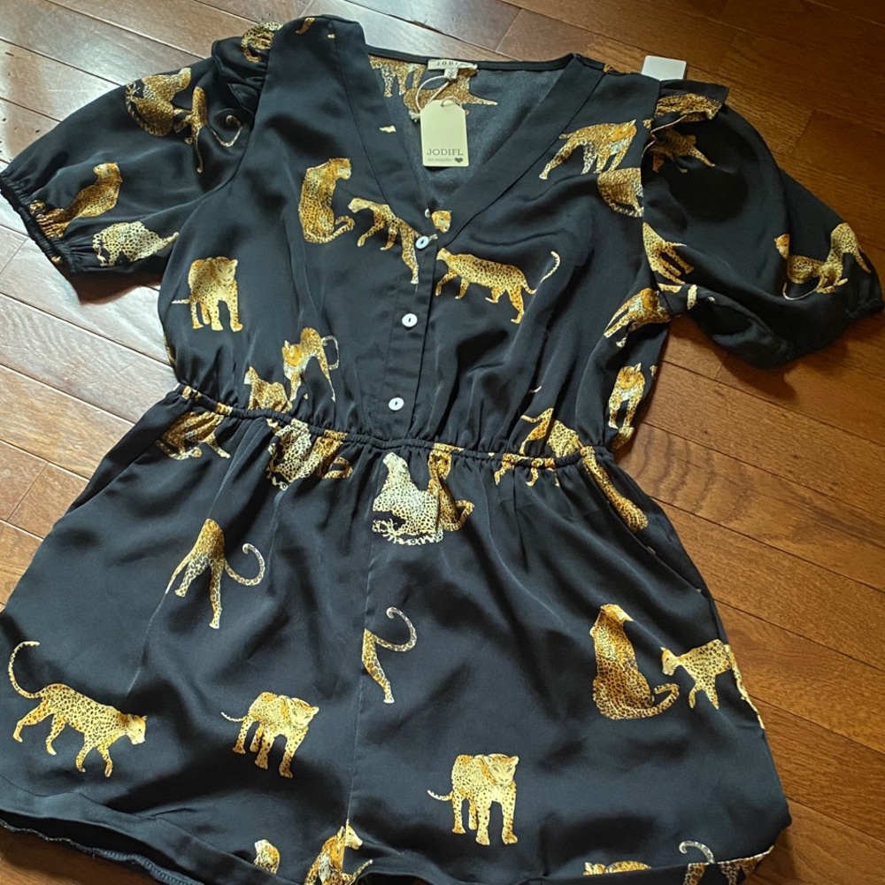 $50 Black and Gold Animal Print Romper size small